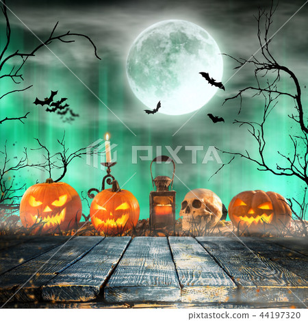 Halloween pumpkins on old wooden planks. Halloween pumpkins on old wooden planks. 44197320