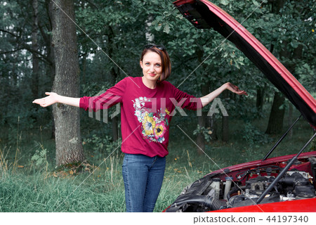 young girl with the red car young girl with the red car 44197340