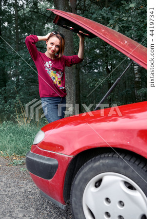 young girl with the red car young girl with the red car 44197341