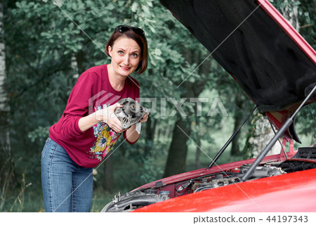young girl with the red car young girl with the red car 44197343