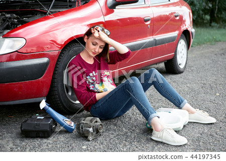 young girl with the red car young girl with the red car 44197345