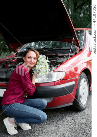 young girl with the red car young girl with the red car 44197350