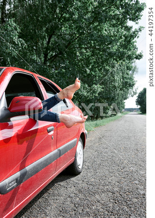 young girl with the red car 44197354