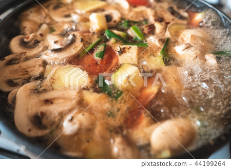 Soup is brewed in a saucepan Soup is brewed in a saucepan 44199264