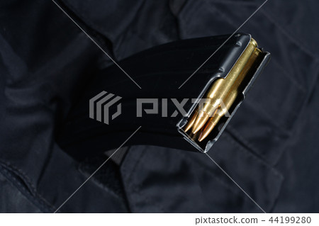 M-16 30rd magazine with ammo on black uniform M-16 30rd magazine with ammo on black uniform 44199280