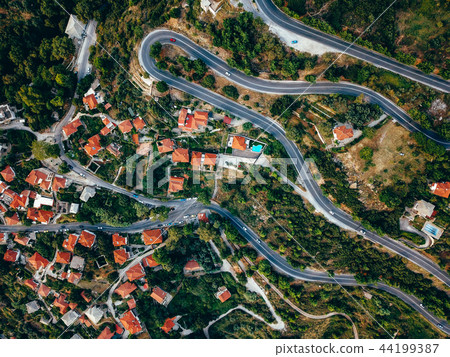 Old european city with red tiled roofs of houses 44199387