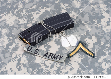 M-16 magazine with ammo on US Army uniform 44199628