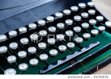 Close up photo of antique typewriter keys, shallow focus Close up photo of antique typewriter keys, shallow focus 44200636