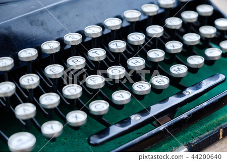 Close up photo of antique typewriter keys, shallow focus 44200640