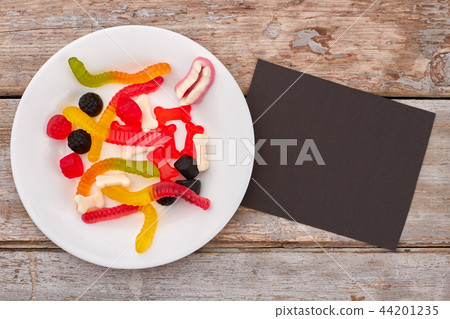 Colorful chewy candies on plate. Colorful chewy candies on plate. 44201235
