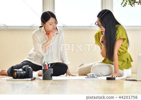 Two women colleagues in creative work Two women colleagues in creative work 44201756