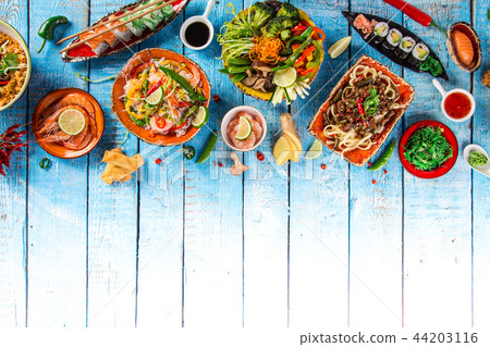 Various of asian meals on rustic background , top view , place for text. Various of asian meals on rustic background , top view , place for text. 44203116