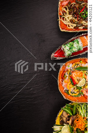 Various of asian meals on rustic background , top view , place for text. Various of asian meals on rustic background , top view , place for text. 44203121