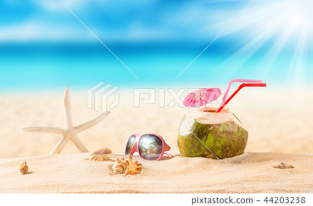 summer coconut drink on the beach. summer coconut drink on the beach. 44203238