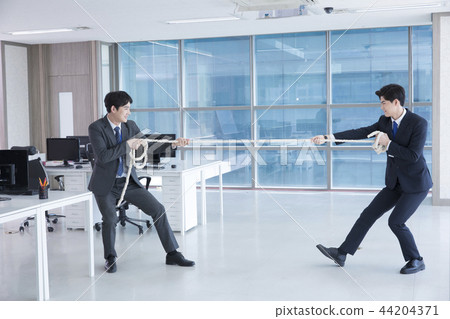 A day of young businessman in the office 051 44204371