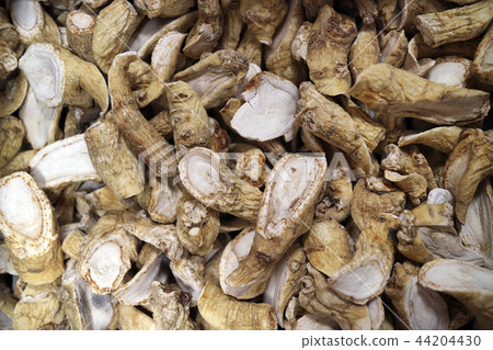 Chinese traditional medicine, close up dry herbs or leaves top view 156 Chinese traditional medicine, close up dry herbs or leaves top view 156 44204430
