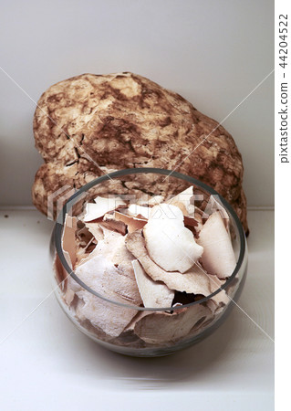 Chinese traditional medicine, dry leaves in glass bowl white isolated background. 073 Chinese traditional medicine, dry leaves in glass bowl white isolated background. 073 44204522