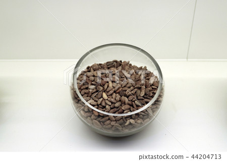 Chinese traditional medicine, dry leaves in glass bowl white isolated background. 083 Chinese traditional medicine, dry leaves in glass bowl white isolated background. 083 44204713