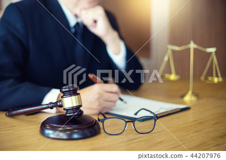 lawyer or judge work in the office with gavel lawyer or judge work in the office with gavel 44207976
