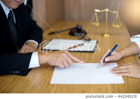 Judge gavel with Justice lawyers having meeting Judge gavel with Justice lawyers having meeting 44208028