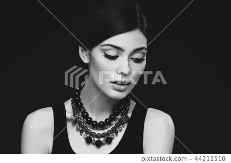 beautiful girl with hairdo on balck background beautiful girl with hairdo on balck background 44211510