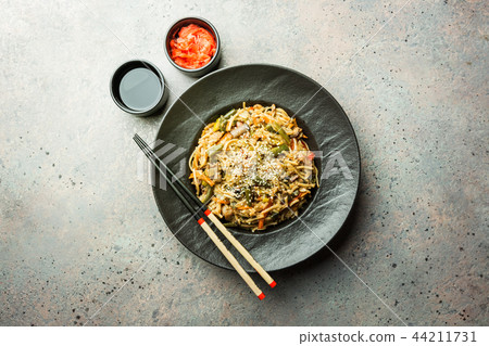 Plate of stir fry noodles 44211731