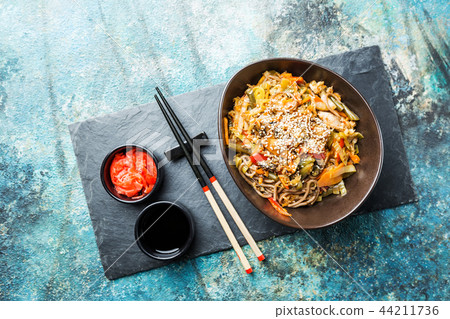 Plate of stir fry noodles 44211736