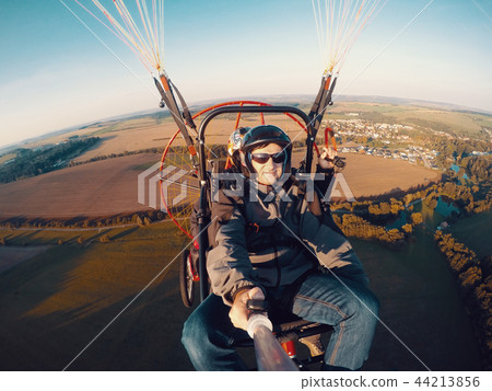 Powered paragliding tandem flight Powered paragliding tandem flight 44213856