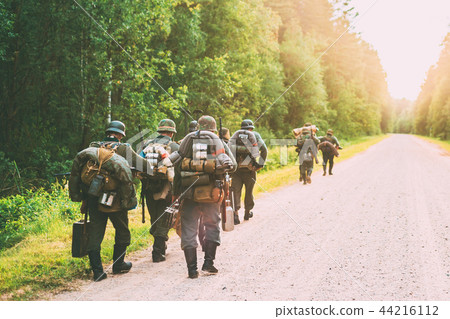 German Infantry Soldier In World War II Marching Walking Along F German Infantry Soldier In World War II Marching Walking Along F 44216112