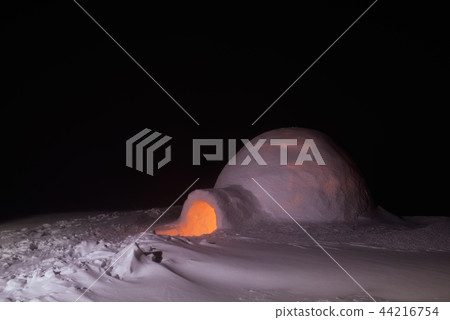 House of snow in mountains at night House of snow in mountains at night 44216754