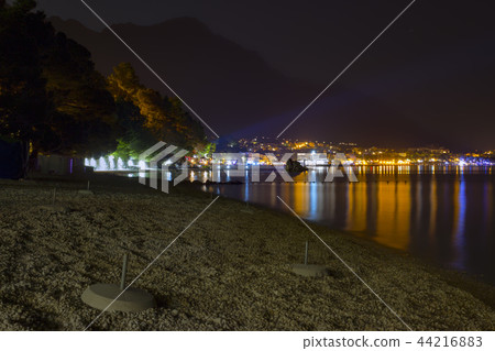 Night view of the illuminated seaside town Night view of the illuminated seaside town 44216883