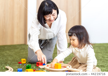 parent and child playing parent and child playing 44219716