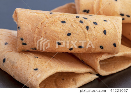 Rolled wafer called "thong muan" - Thai snack Rolled wafer called "thong muan" - Thai snack 44221067