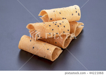 Rolled wafer called "thong muan" - Thai snack Rolled wafer called "thong muan" - Thai snack 44221068