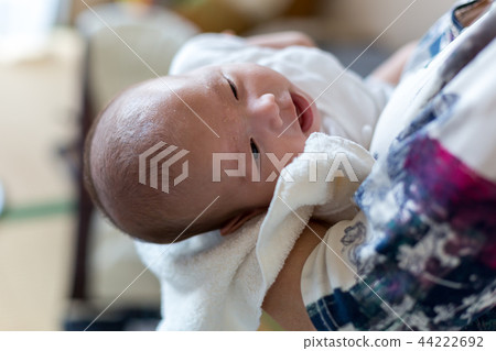 Sleeping face of a newborn baby Sleeping face of a newborn baby 44222692