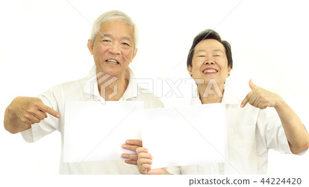 Happy Asian senior couple white blank sign promote Happy Asian senior couple white blank sign promote 44224420