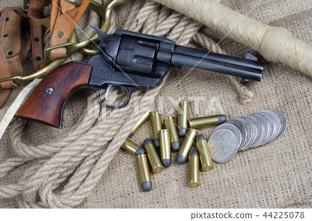 The .45 caliber revolver with western accessories The .45 caliber revolver with western accessories 44225078