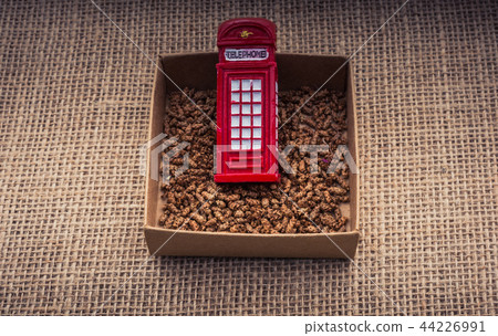 Red color phone booth in a box Red color phone booth in a box 44226991