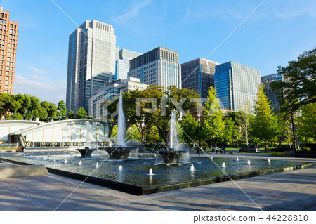 Wadakura Fountain Park and Marunouchi Building Street at dusk Wadakura Fountain Park and Marunouchi Building Street at dusk 44228810