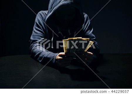 man giving bribe banknote money corruption scam 44229037