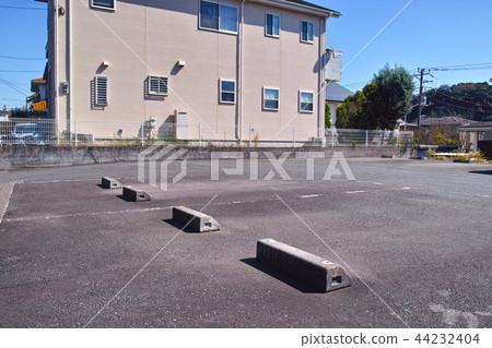 Parking lot in a residential area Parking lot in a residential area 44232404