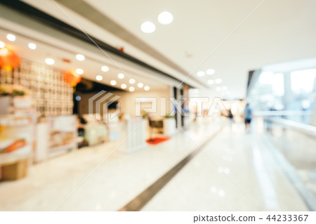 Abstract blur and defocused shopping mall of department store interior Abstract blur and defocused shopping mall of department store interior 44233367