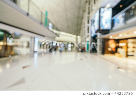Abstract blur and defocused airport terminal interior Abstract blur and defocused airport terminal interior 44233786