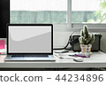 blank screen laptop on working desk 44234896