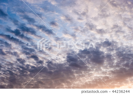 Colorful fluffy clouds in blue sky 44236244