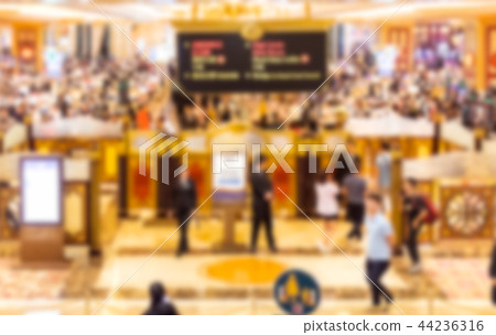 Blurred scene gambling tables at casino 44236316