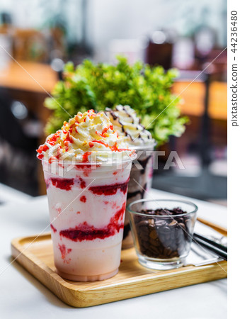 strawberry and chocolate frappe with whipped cream 44236480
