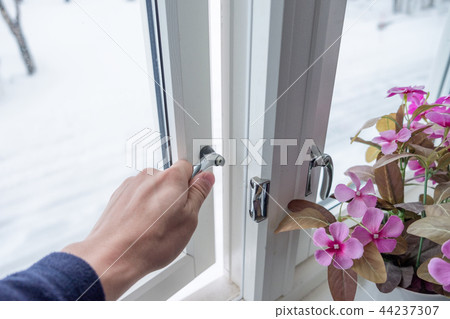 Hand opening window with flower decoration Hand opening window with flower decoration 44237307