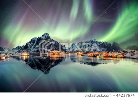 Aurora borealis dancing on mountain 44237674