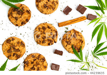 Chocolate chip cookies with marijuana isolated 44239635